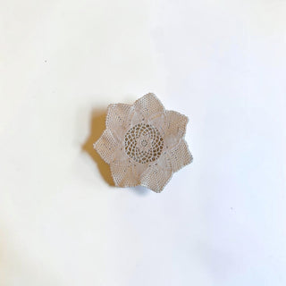 Her Good Eye beige star-shaped handmade crochet doily with intricate lace-like thread work for home decor