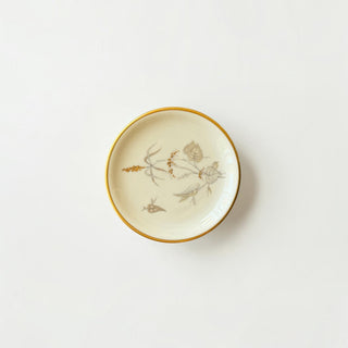 Her Good Eye cream porcelain trinket dish with hand-painted botanical motif and gold-tone rim on white background