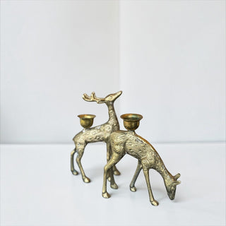 Her Good Eye vintage brass deer figurine candle holders with textured fur detail and integrated taper candle cups.