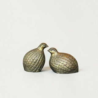 Her Good Eye vintage-style brass quail bird figurines with textured feather details and a warm burnished gold finish.