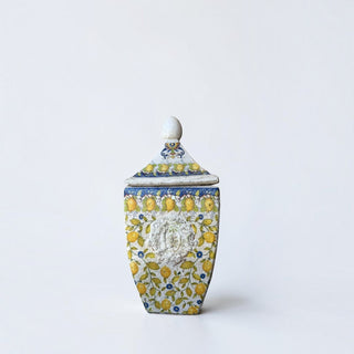 Her Good Eye decorative ceramic lidded jar with hand-painted yellow lemons, blue flowers, and vintage crackle glaze.