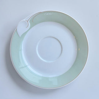Her Good Eye vintage Chloe Fleuron mint and white porcelain tea saucer with gold trim and molded floral detail