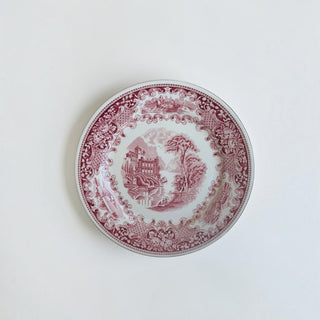 Her Good Eye vintage ceramic dinner plate with crimson red transferware castle scene and ornate floral border.