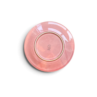Underside of a Her Good Eye dusty rose ceramic dinner plate showing the base and maker mark