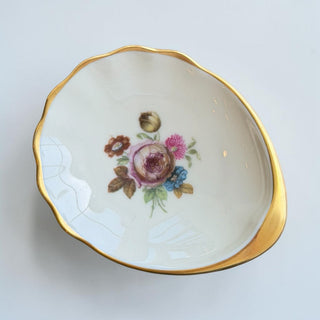 Her Good Eye floral gilded porcelain trinket dish with scalloped gold rim and vintage floral bouquet painting.