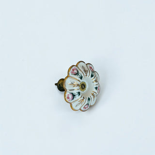 Her Good Eye vintage floral porcelain cabinet knob with pink rose pattern, scalloped edges, and gold-tone accents.