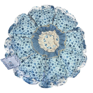Her Good Eye blue and white floral fabric throw pillow with denim ruffle and crocheted lace center medallion.