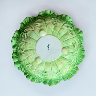 Her Good Eye decorative green ceramic serving bowl with ruffled edge, shaped like lettuce leaves.