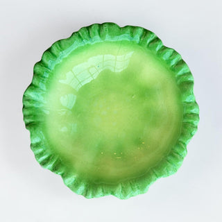 Her Good Eye decorative ceramic serving bowl in glossy green with a ruffled, scalloped edge. Ideal for trinkets or candy.