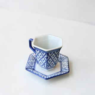 Her Good Eye blue and white octagonal ceramic coffee cup and saucer set with Chinoiserie pattern