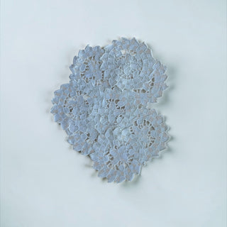 Her Good Eye vintage-inspired pale blue lace doily with intricate floral openwork design for home decor
