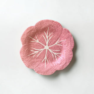 Her Good Eye pink ceramic cabbage leaf serving plate with white embossed veining and a glossy finish.