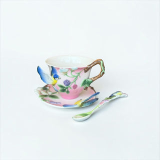 Her Good Eye porcelain tea cup and saucer set featuring 3D blue tit bird, blackberry motifs, and branch-shaped handle.