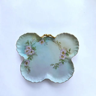 Her Good Eye vintage butterfly porcelain serving dish with hand-painted wild roses, blue-green wash, and gold-gilded trim.