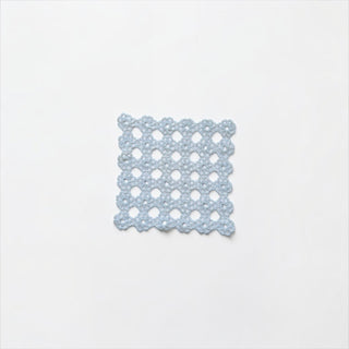 Her Good Eye handmade square crochet lace doily in powder blue with a delicate floral lattice pattern and scalloped edge
