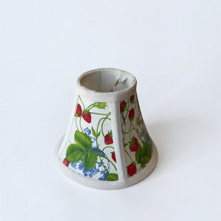 Her Good Eye fabric lamp shade featuring a vintage strawberry and blue porcelain pattern on a white background.