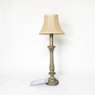 Her Good Eye vintage ornate brass table lamp with a cream beaded fabric shade and fluted pedestal base.