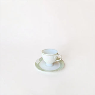 Her Good Eye vintage Karl Lagerfeld for Chloe Fleuron tea cup in mint, white, and gold with molded floral relief detail.