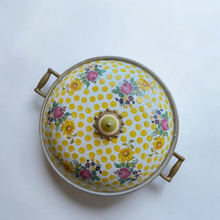 Her Good Eye vintage yellow polka dot floral enamel stock pot with brass handles and green knob lid.