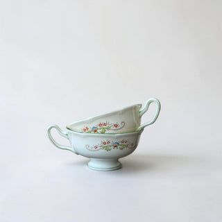 Her Good Eye vintage porcelain gravy boats with red floral pattern, blue accents, and mint green trim. Set of two.