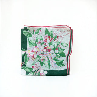 Her Good Eye vintage floral handkerchief with pink blossoms, green leaves, forest green border, and red rolled edge.