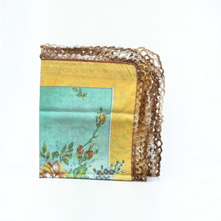 Her Good Eye vintage floral handkerchief in yellow and teal with an intricate brown hand-crocheted lace border.