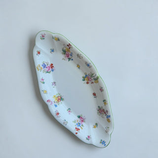 Her Good Eye vintage porcelain serving dish with scalloped edges and colorful hand-painted floral motifs on white