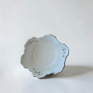 Her Good Eye vintage floral porcelain planter pot with scalloped gold rim and delicate white and green floral motifs.