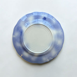 Her Good Eye vintage porcelain dinner plate featuring a blue and white floral pattern with a scalloped edge