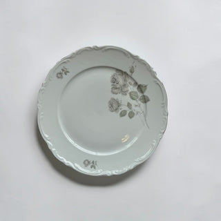 Her Good Eye vintage porcelain dinner plate with grey floral rose motif and scalloped embossed rim on white background