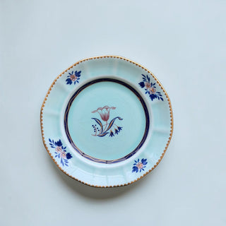 Her Good Eye vintage porcelain plate with pale blue crackle glaze, floral motifs, and gold-trimmed scalloped edges.