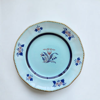 Her Good Eye vintage porcelain dinner plate with pale blue crackle glaze, floral motif, navy border, and gold trim.