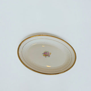 Her Good Eye vintage oval porcelain serving platter with cream base, pink rose floral design, and gold rim.