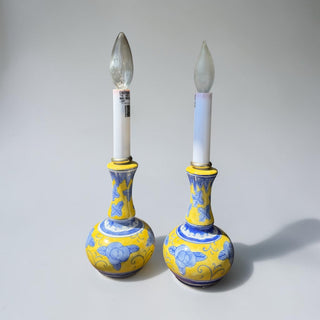 Her Good Eye decorative ceramic table lamp with blue floral accents on a yellow base. Features a curved silhouette and traditional Asian pottery style.